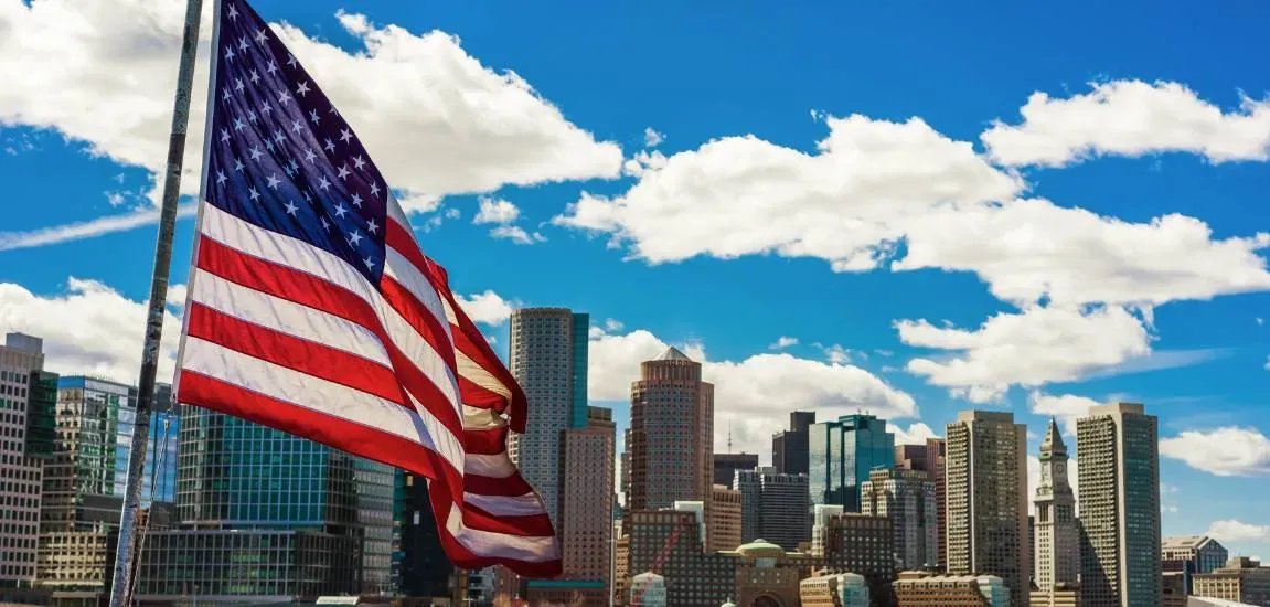 50-us-states-facts-boston-skyline-flag_hero